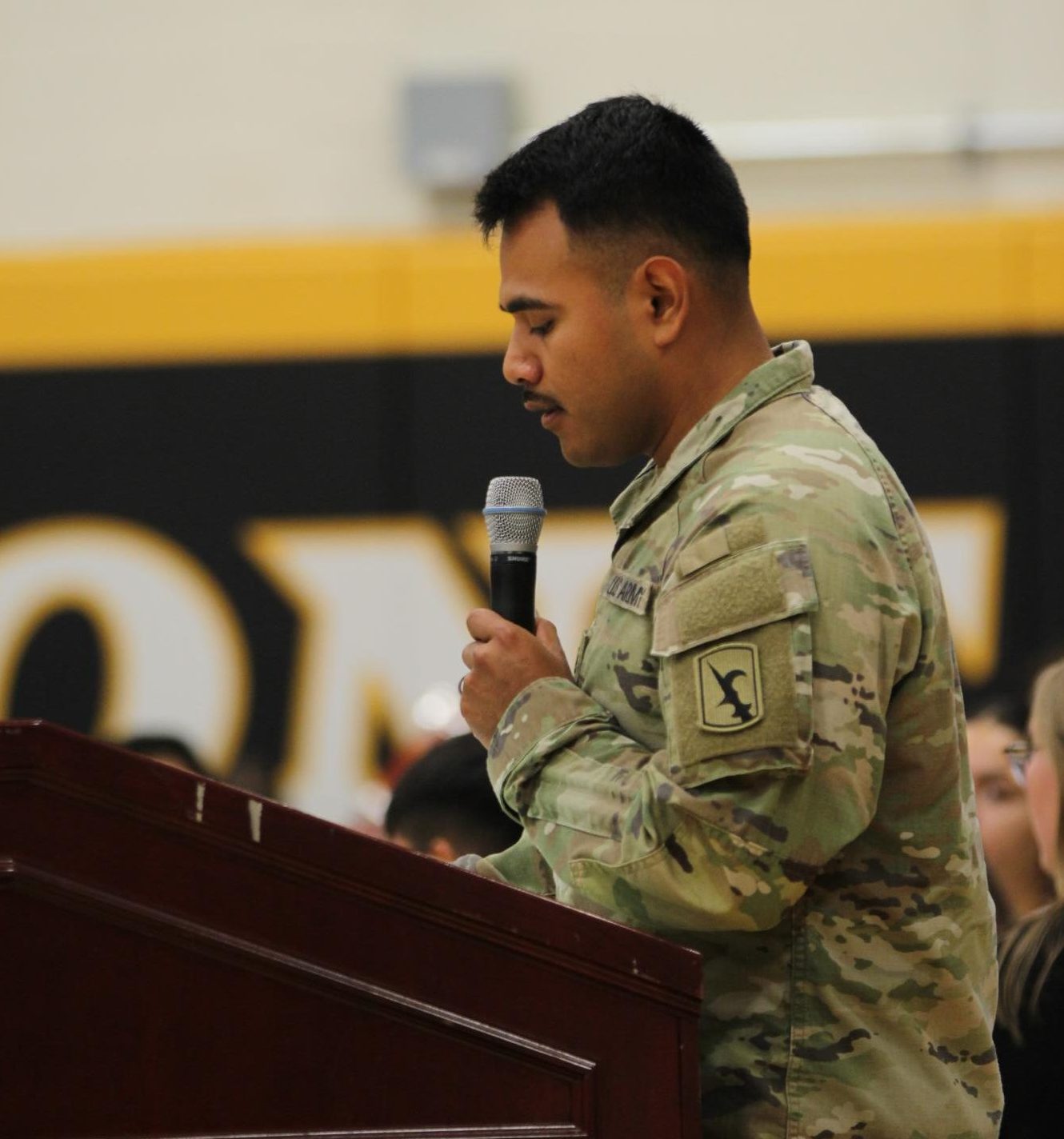 Sgt. Govani E. Gonzalez-Ramos speaks during the Veterans Day assembly at the high school on Nov. 11. He addressed students about the meaning of service and the experiences of veterans across generations.