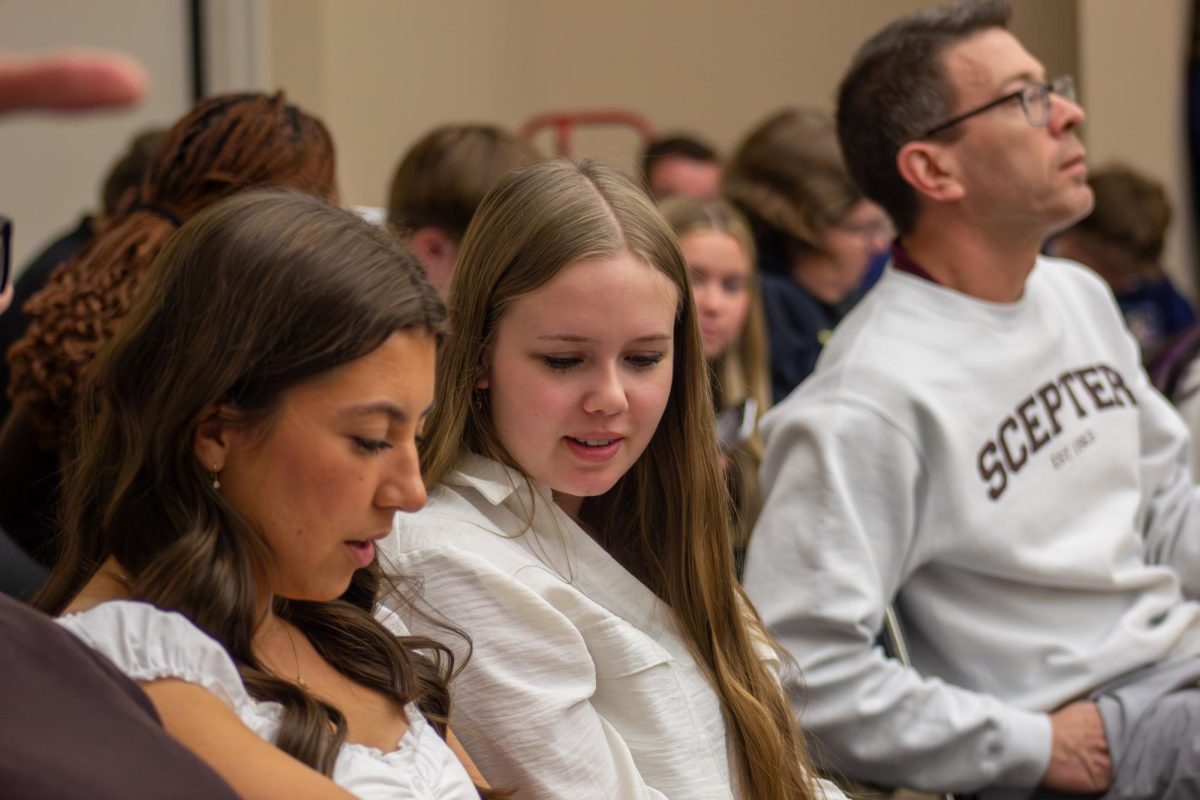 Conversing with Ava Placek, sophomore Samantha Skinner waits until she needs to accept her 7th place award for headline writing. Skinner shares her favorite moments. “When we went to target,” Skinner said, “and when Mr. Stevens forgot Ava at school and we had to go back for her.”